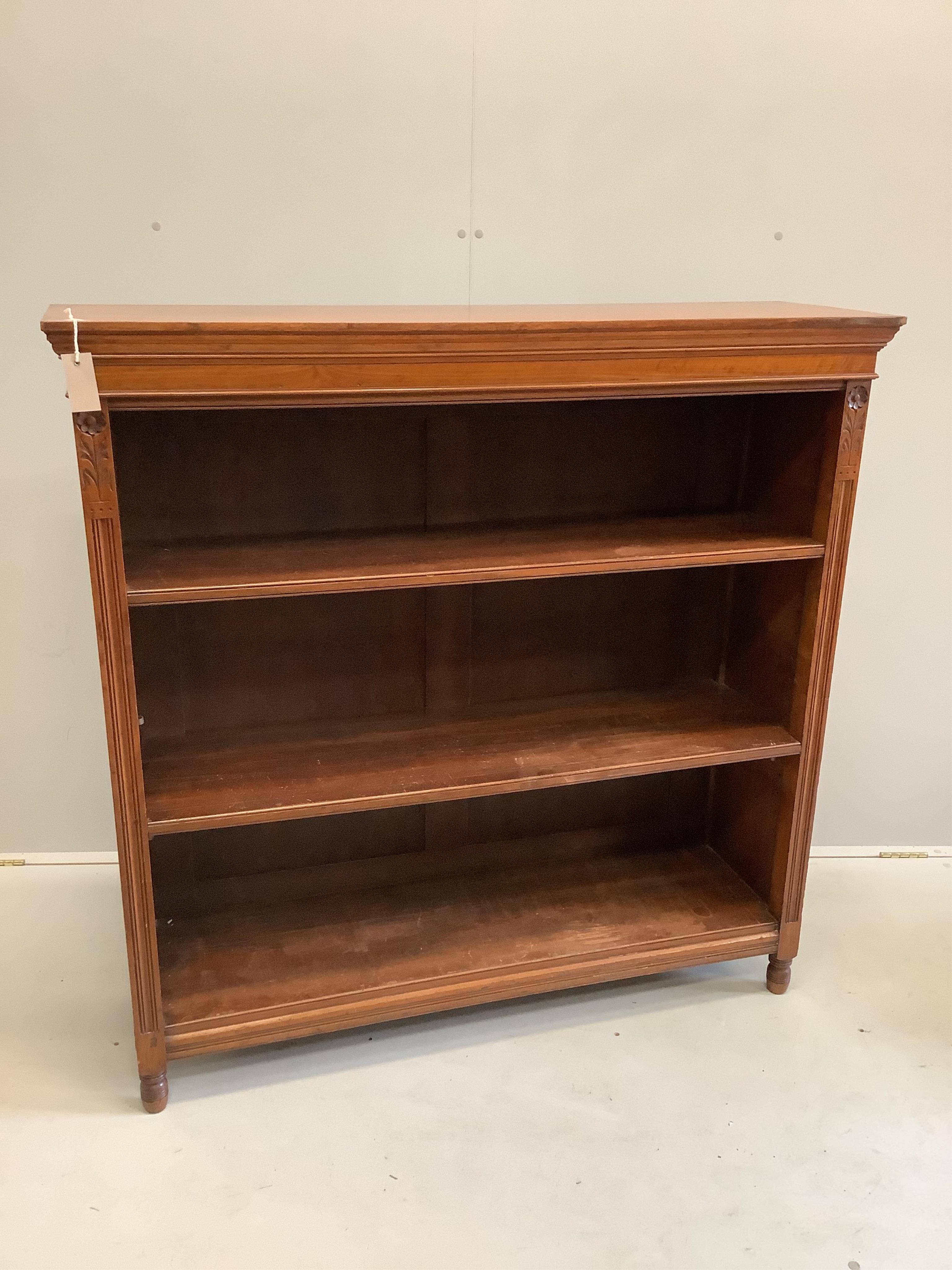 A late Victorian walnut open bookcase, width 122cm, depth 36cm, height 122cm